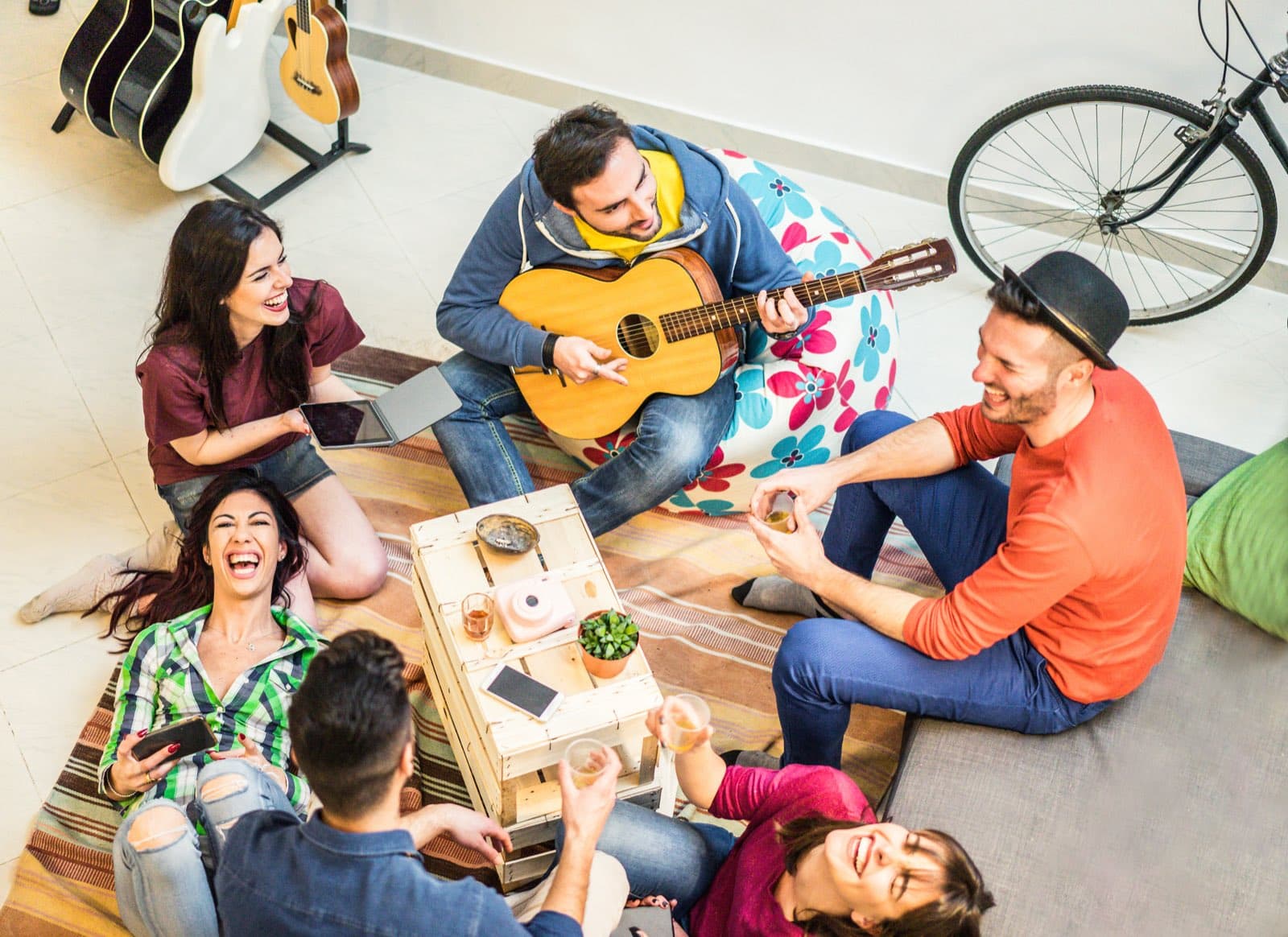Students relaxing together in the common area of a student residence